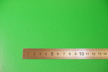 ruler on a green background