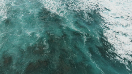 Fototapeta na wymiar Top down view of the turquoise water of the Atlantic Ocean