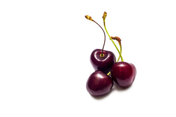 Ripe juicy sweet cherry isolated on a white background