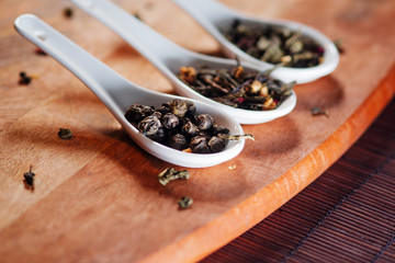 Still life with different varieties of tea, dry tea leaf. making of tasty and healthy hot drink.