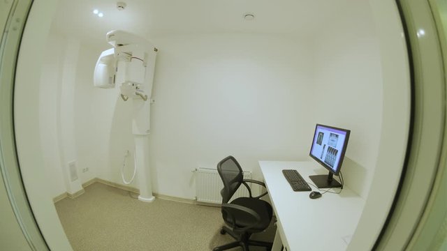 Dental computer tomography. X-ray scan. Creating a panoramic picture of the teeth. Professional dental diagnostics. Cephalometry. Orthopantomography. Fisheye
