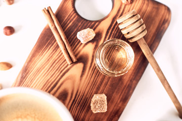 breakfast pattern, coffee, honey, cinnamon sticks, nuts, sugar. Good morning concept.