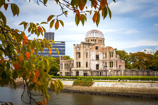 Hiroshima, Japan - October 2 2019: The ruins of the Hiroshima atomic bomb dome on an Autumn evening. Now listed as a World Heritage site to communicate the devastation caused by nuclear weapons.