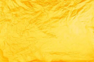 Yellow, orange, warm background. Creased paper texture.