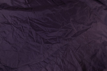Blue, violet, purple background. Creased paper texture.