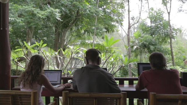coed digital nomads working in the jungle