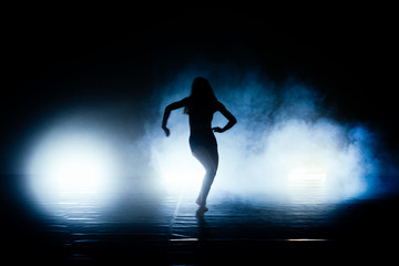 Fototapeta na wymiar Modern ballet dancer practicing in studio