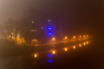 Thick Fog in the night Holesovice about River Vltava. Holesovice is the most cool Prague District, Czech Republic.
