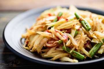 Thai food (Som Tum), spicy green papaya salad