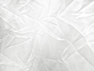 Soft white wrinkled fabric background