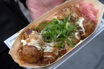 Plate of Takoyaki in Dotonbori area in Osaka