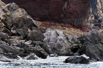 Rocky shore in the easternmost peninsula of Portuguese island Madeira, Sao Lourenco Point (locally known as Vereda da Ponta de Sao Lourenco). Waves breaking over volcanic cliffs.