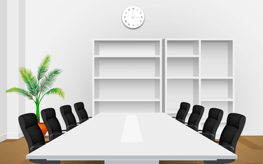white table and chairs with bookcase in the meeting room