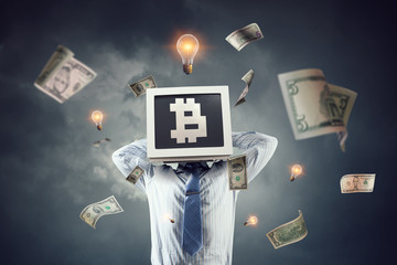 Monitor headed businessman. Mixed media