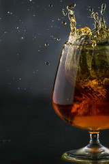 Spray in cognac glass