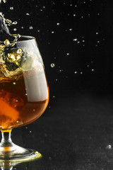 Spray in cognac glass