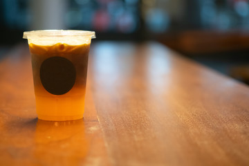 Iced fresh orange juice topped with espresso