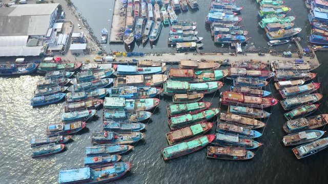 Aerial view of fisherman boats berthing at port