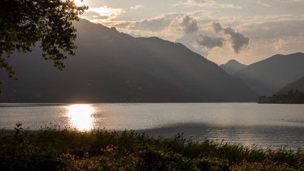 Ledro, Italy. The Ledro lake is a natural alpine lake. Amazing landscape at sunset. Italian Alps. Touristic destination. Summer time