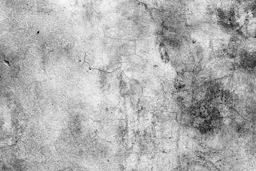 Texture of a concrete wall with cracks and scratches which can be used as a background