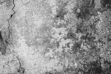 Texture of a concrete wall with cracks and scratches which can be used as a background