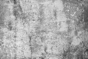 Texture of a concrete wall with cracks and scratches which can be used as a background