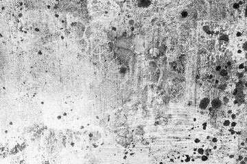 Texture of a concrete wall with cracks and scratches which can be used as a background
