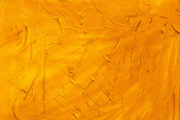 abstract yellow golden grunge stucco wall backdrop