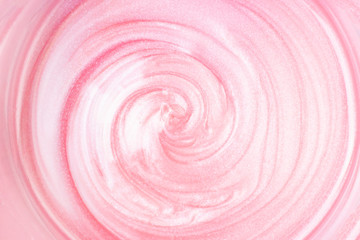 background texture liquid wax for depilation of pink color. The concept of depilation, waxing,...
