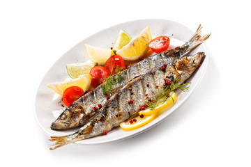 Fish dish - grilled herrings with vegetables