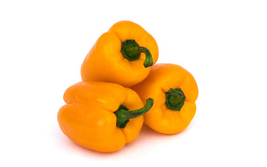 Yellows peppers on a white background