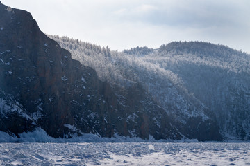 winter landscape with mountains and snowy trees on the island of olkhon on Baikal