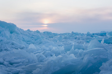 Fototapeta na wymiar landscape with Baikal ice and sunset sky