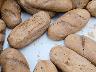 Fototapeta na wymiar Freshly baked bread with crispy crust from cereals, healthy food