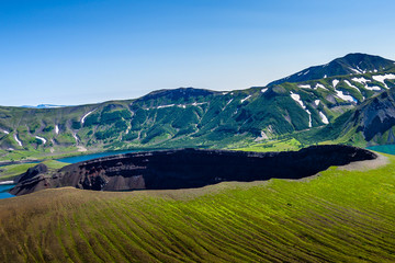 Panoramic view of the city Petropavlovsk-Kamchatsky and volcanoes: Koryaksky Volcano, Avacha Volcano, Kozelsky Volcano. Russian Far East, Kamchatka Peninsula. © vaclav