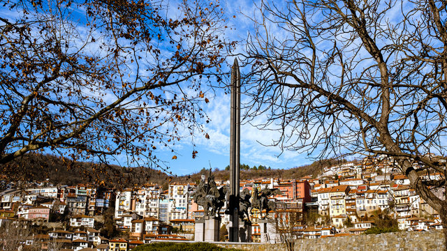 City landmark vertical architectural obelisk monument amid historic sculpture