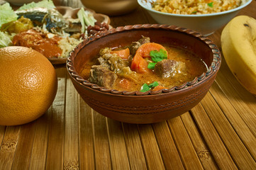 Ghanaian palmnut soup with goat