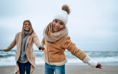 Family on the beach near the sea