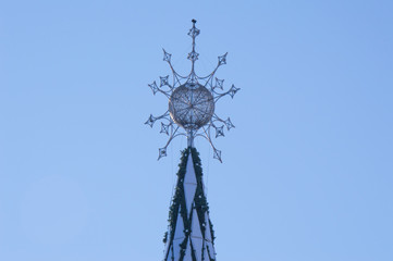 Installation of a Christmas tree. Christmas star.