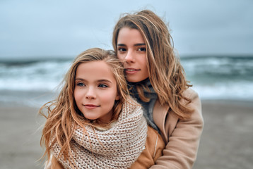 Family on the beach near the sea