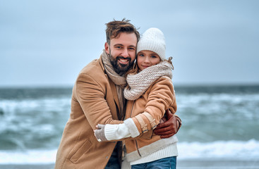 Family on the beach near the sea