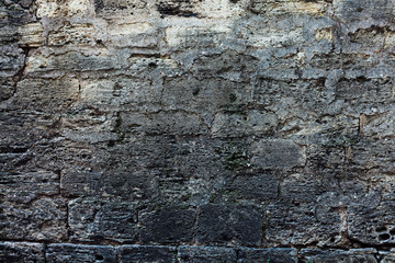 old gray brick wall retro background texture of the stone