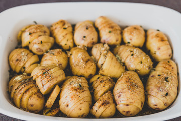 potato bake with herbs about to go in the oven