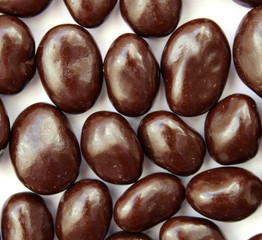 chocolate drops on white background