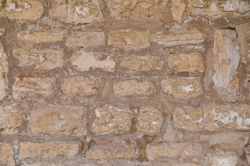 Closeup view of brown old vintage brick wall. Abstract photo background. Horizontal color image.