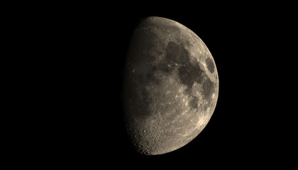 The Moon is the Earth's largest natural satellite and can be seen in the night sky.