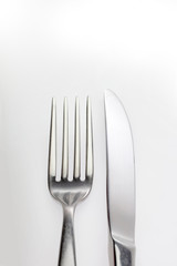 glittering reflection on a fork and knife
