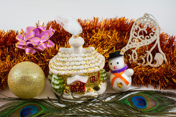 Yellow ball and christmas toys on a white background