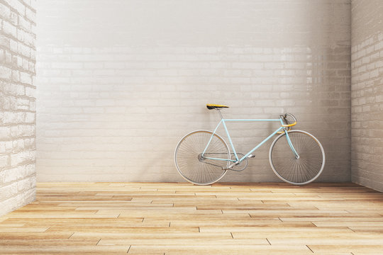 Minimalistic brick hipster interior with bicycle