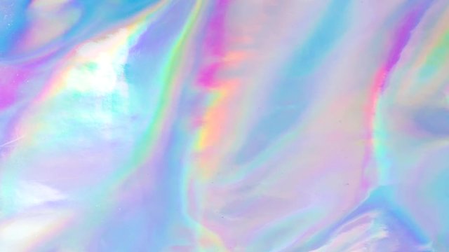 Holographic foil motion looping of purple liquid movement. Aesthetic concept.